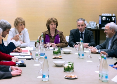 U.S. Secretary of State John Kerry (2nd L), European Union foreign policy chief Catherine Ashton (C ) and Iranian Foreign Minister Mohammad Javad Zarif (2ndR) wait prior to a meeting on November 9, 2013, on the third day of talks on Iran's nuclear program at the Intercontinental Hotel in Geneva Switzerland. (Jean-Christophe Bott/AFP/Getty Images)