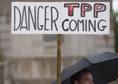 Demonstrators protest against the legislation to give US President Barack Obama fast-track authority to advance trade deals, including the Trans-Pacific Partnership (TPP), during a protest march on Capitol Hill in Washington, DC, May 21, 2015.  (Saul Loeb/AFP/Getty Images)