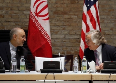 U.S. Secretary of Energy Ernest Moniz (R) and Head of the Iranian Atomic Energy Organization Ali Akbar Salehi (L) meet at a hotel where the Iran nuclear talks meetings are being held in Vienna, Austria on July 9, 2015. (Carlos Barria/AFP/Getty Images)