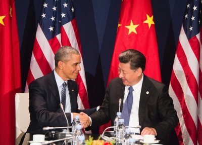 U.S. President Barack Obama (L) shakes hands with Chinese President Xi Jinping during a bilateral meeting ahead of the opening of the UN conference on climate change COP21 on November 30, 2015. (Jim Watson/AFP/Getty Images)