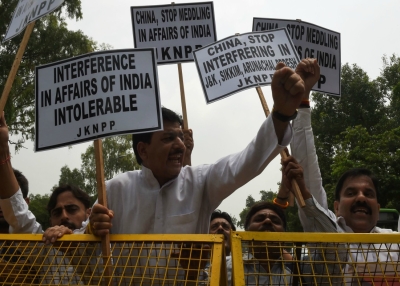 Indian activists of National Panthers Party shout anti Chinese slogans during a protest near the Chinese embassy in New Delhi on July 7, 2017. (Money Sharma/AFP/Getty Images)