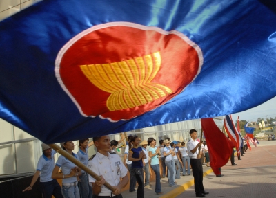 Students carrying ASEAN flags practice outside the Cebu International Convention Center 07 December 2006. The central Philippine city of Cebu is hosting the annual ASEAN summit from 10-14 December where the 10 ASEAN leaders from Brunei, Cambodia, Indonesia, Laos, Malaysian, Myanmar, Philippines, Singapore, Thailand and Vietnam are attending will also hold talks with counterparts among major trading partners as part of the second East Asia summit.