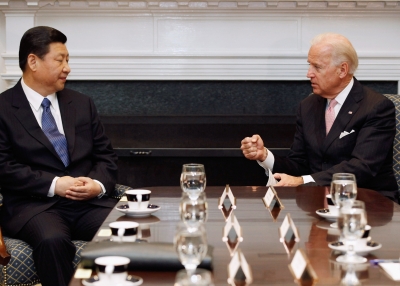 U.S. Vice President Joe Biden (R) and Chinese Vice President Xi Jinping talk during an expanded bilateral meeting with other U.S. and Chinese officials in the Roosevelt Room at the White House February 14, 2012 in Washington, DC. While in Washington, Vice President Xi will meet with Biden, President Barack Obama and other senior Administration officials to discuss a broad range of bilateral, regional, and global issues. 