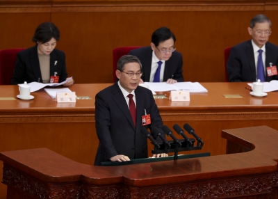 Chinese Premier Li Qiang delivers a speech during the opening of the second session of the 14th National People's Congress