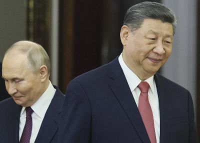 Russian President Vladimir Putin meets with China's President Xi Jinping at the Kremlin in Moscow 