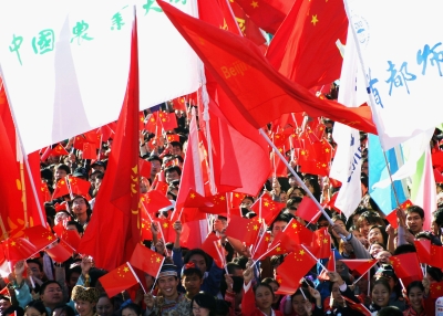 A group of Chinese students cheering.