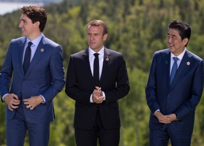 Justin Trudeau, Emmanuel Macron, and Shinzo Abe at 2018 G7 Summit