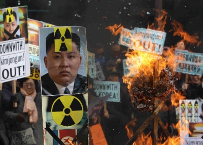 South Korean protesters burn an effigy of North Korea leader Kim Jong-Un during an anti-North Korea rally on February 11, 2016 in Seoul, South Korea. (Chung Sung-Jun/Getty Images)