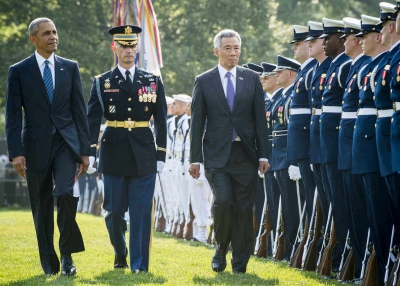 U.S. President Barack Obama and Prime Minister Lee Hsien Loong of Singapore review the troops during official welcoming ceremonies on the South Lawn of the White House on August 2, 2016 in Washington, DC . (Pete Marovich-Pool/Getty Images)